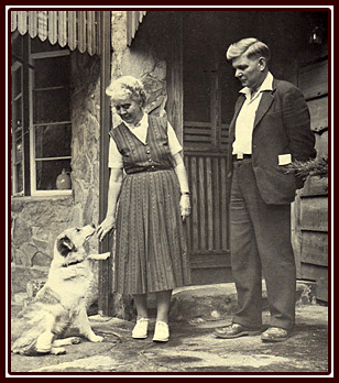George & Marguerite Bidstrup with their dog by the Bidstrup House